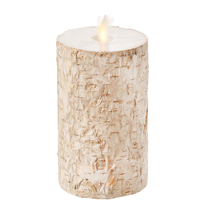 large tan moving flame birch wrapped pillar candle against a white background