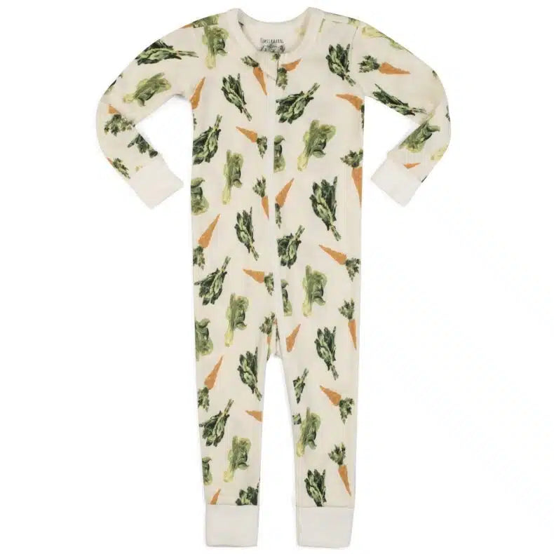 cream pajamas with an all-over pattern of carrots and greens.