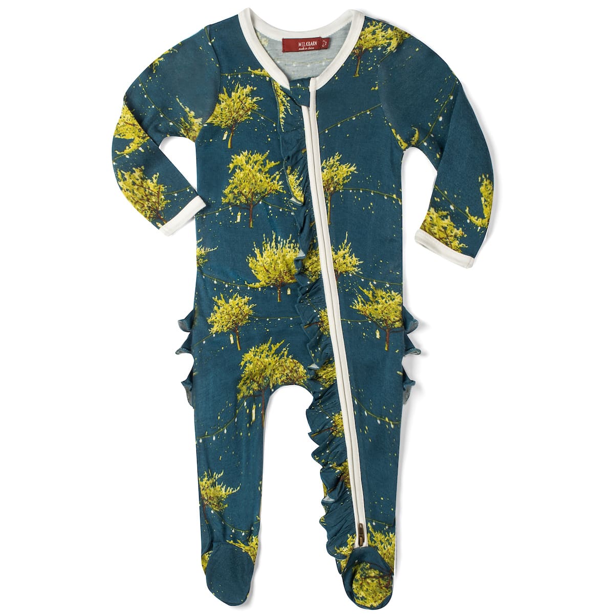 blue footed romper with all-over pattern of trees and fireflies.