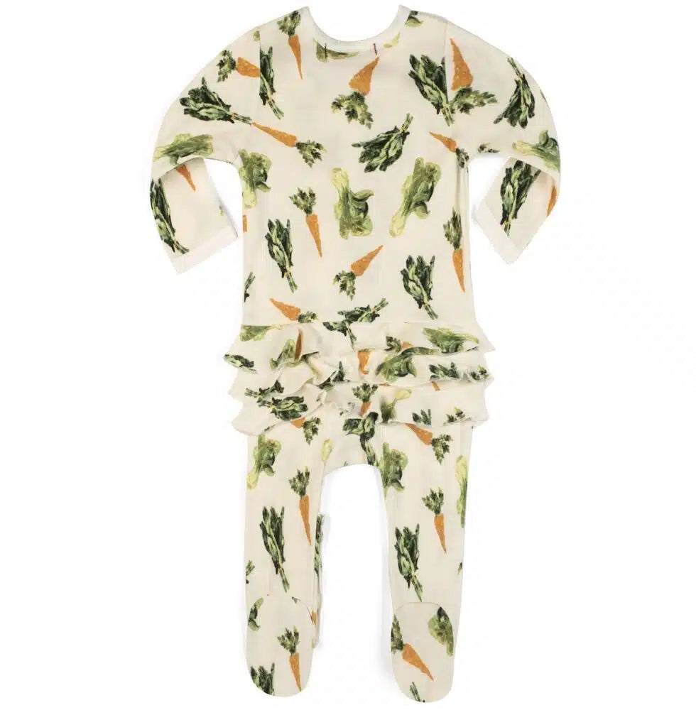 back view of cream footed sleeper with all-over pattern of carrots and greens.