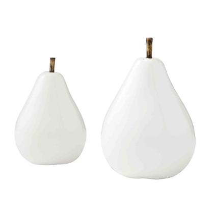 one small and one large white ceramic pear sitter against a white background