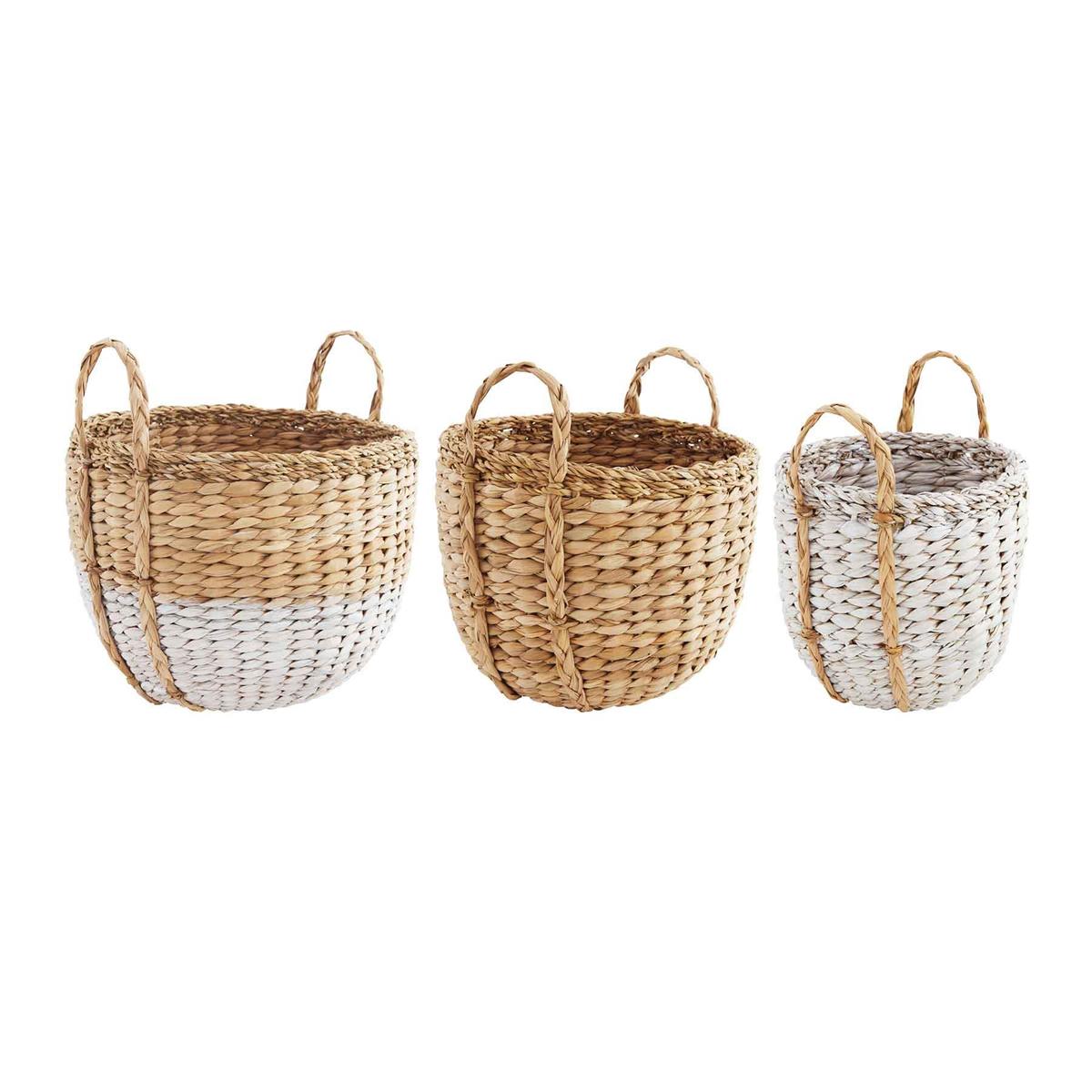 all three sizes of seagrass baskets with handles on a white background