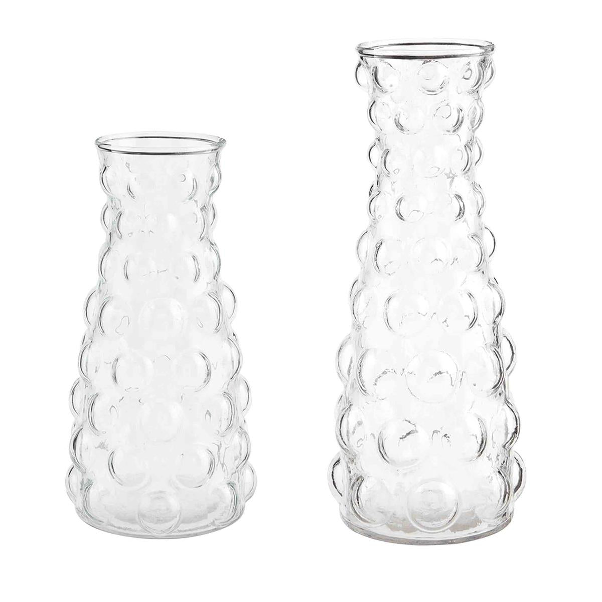 small and large hobnail glass vases displayed against a white background