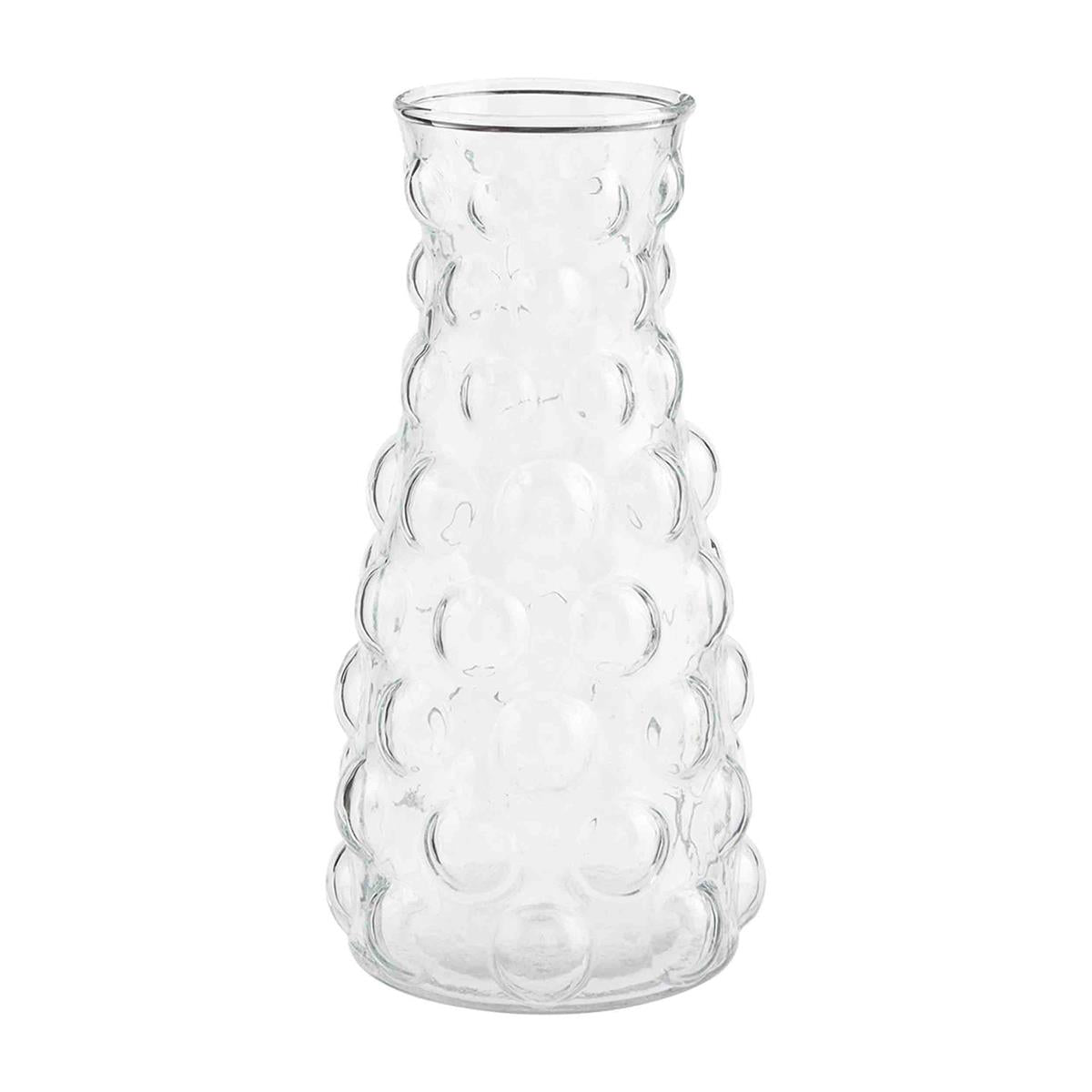 small hobnail glass vase against a white background