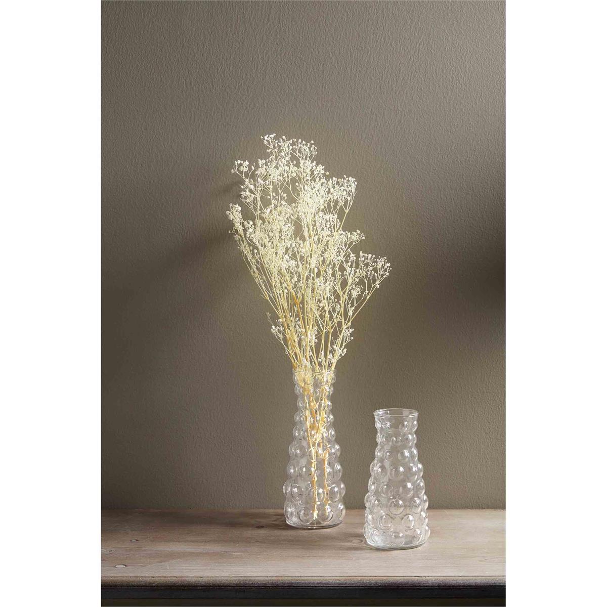 both sizes of hobnail glass vases displayed with dried flowers in the large against a taupe background