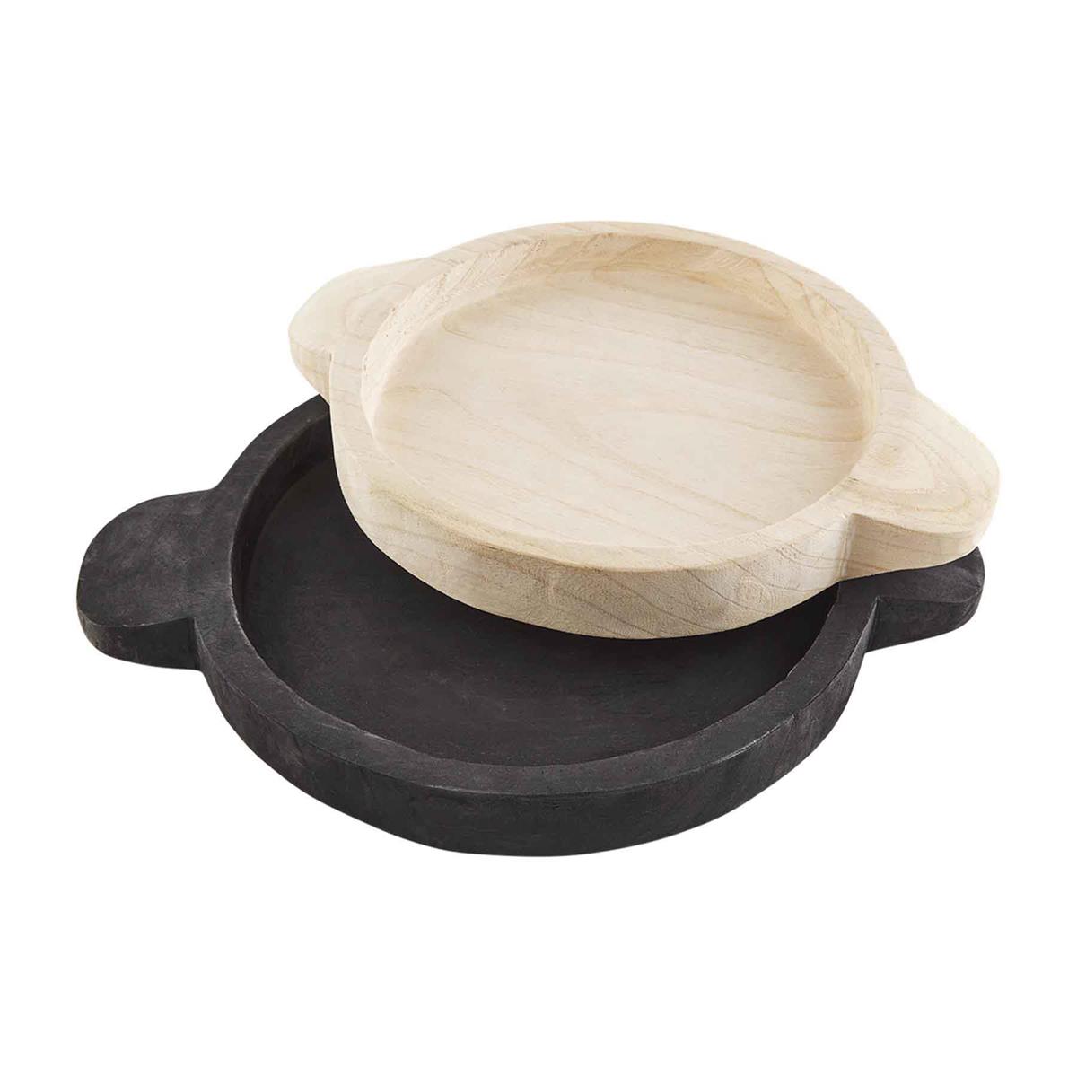 white and black round wood trays with handles on a white background