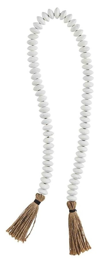 white tassel decor beads on a white background