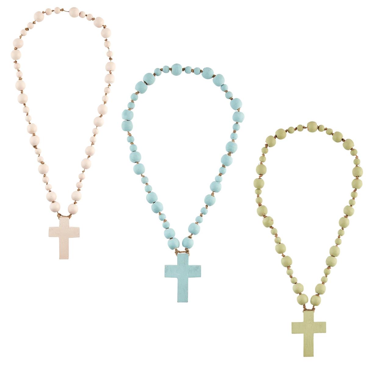all three colors of decorative cross beads displayed on a white background