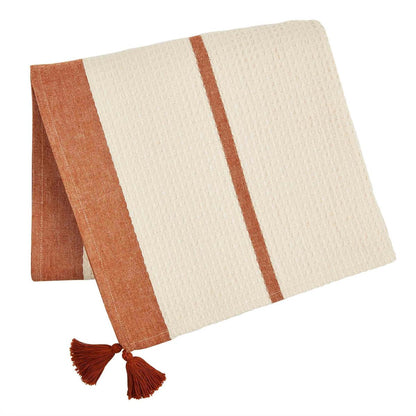 terracotta and cream waffle chambray stripe blanket on a white background