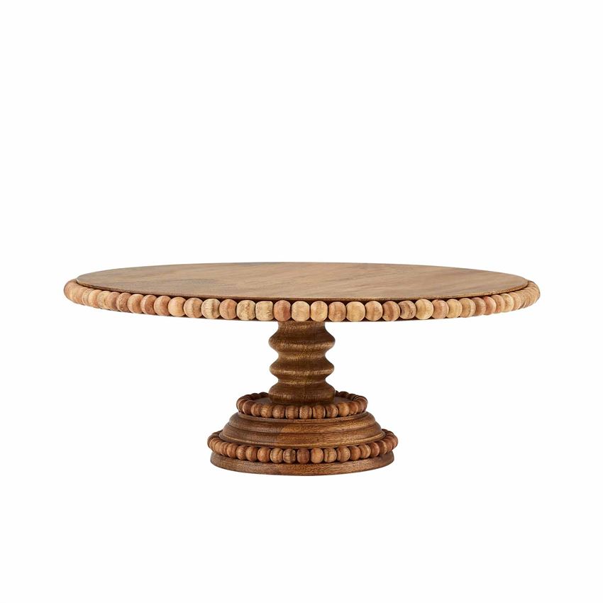 beaded wooden cake stand on a white background
