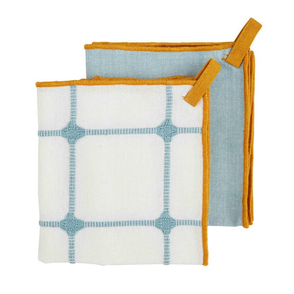 checked and solid blue, orange stitch edge towel set displayed on a white background