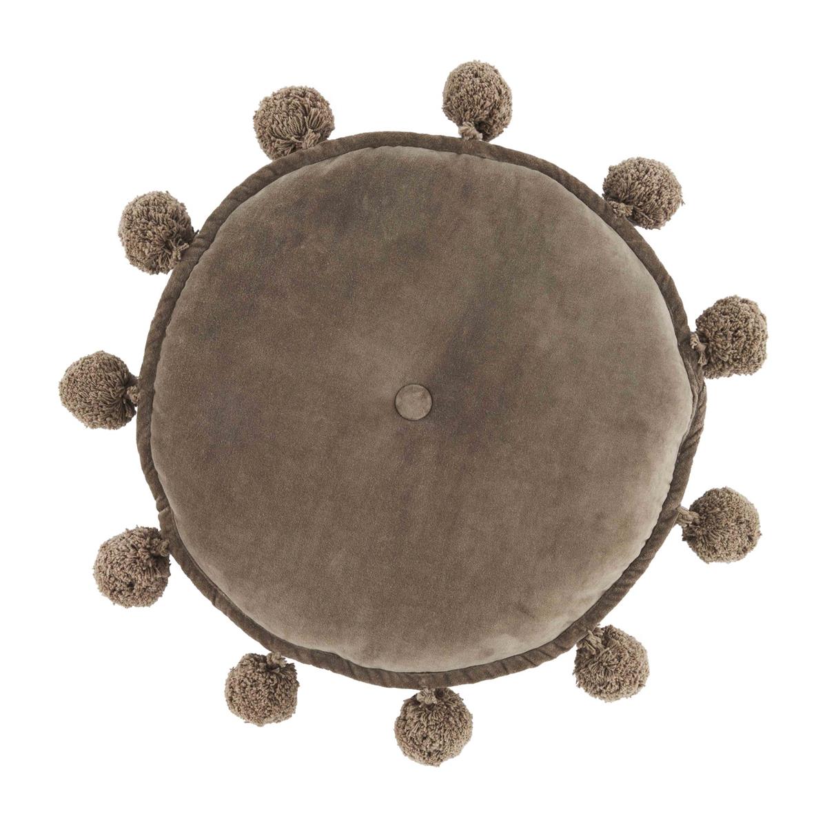 taupe round pillow with yarn poms around the circumference.
