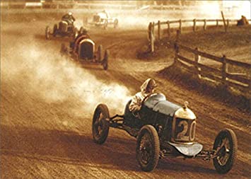 front of card is a photograph of old race cars on a dirt path