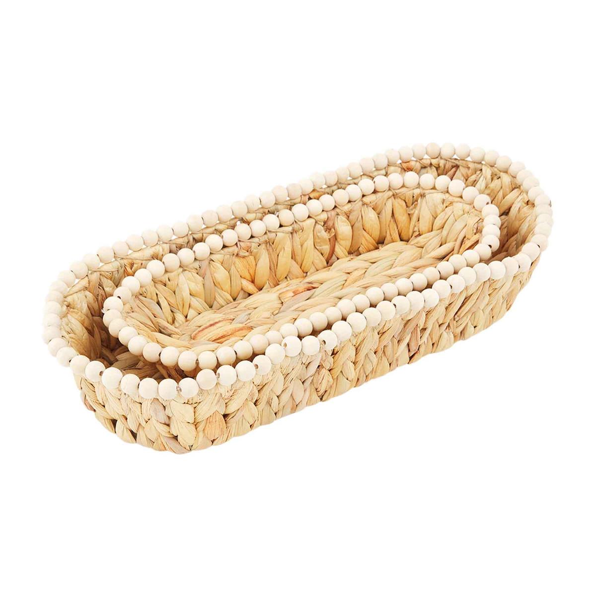 both sizes of stacked hyacinth beaded bread basket on a white background