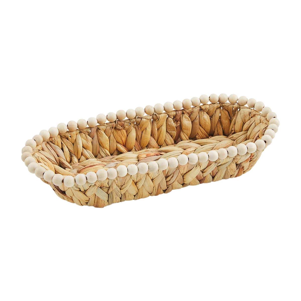 small hyacinth beaded bread basket on a white background