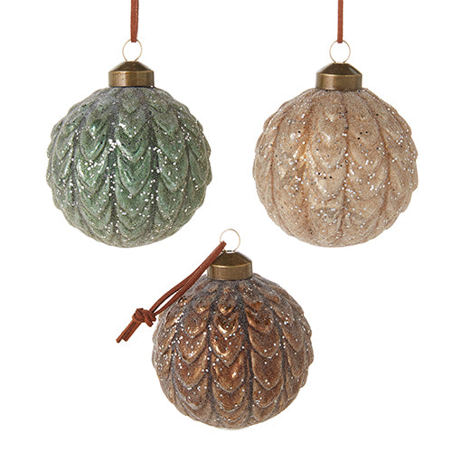 3 glittered ball ornaments with pine cone texture and brown ribbon hanger.