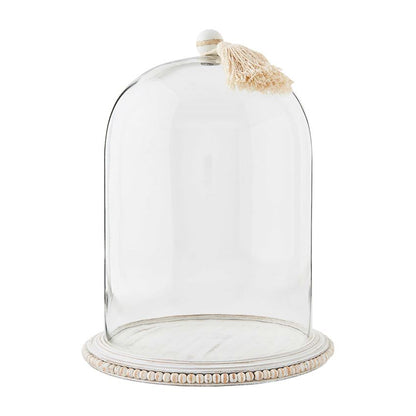 large beaded cloche with tassel on a white background