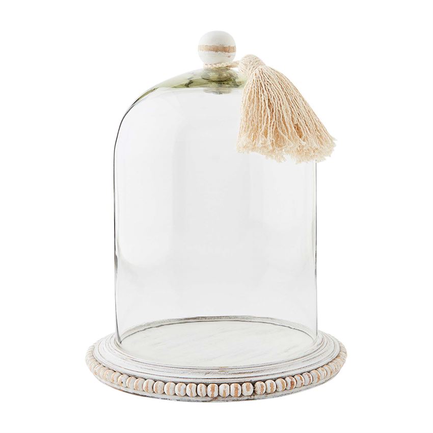 small beaded cloche with tassel on a white background