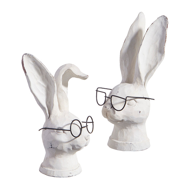 two white bunny bust wearing black glasses with one having a bent ear and the others ears standing straight against a white background