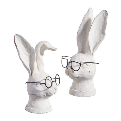two white bunny bust wearing black glasses with one having a bent ear and the others ears standing straight against a white background