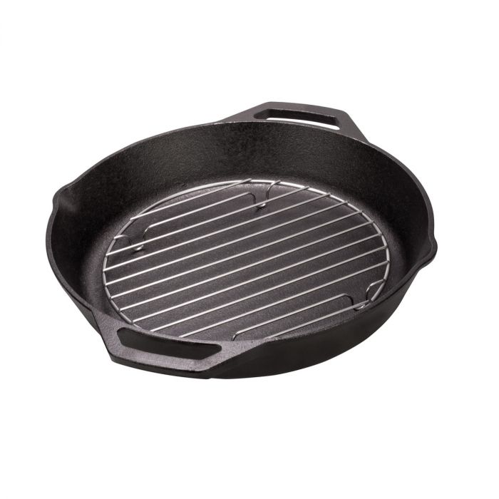 the round cooling rack inside a cast iron skillet on a white background