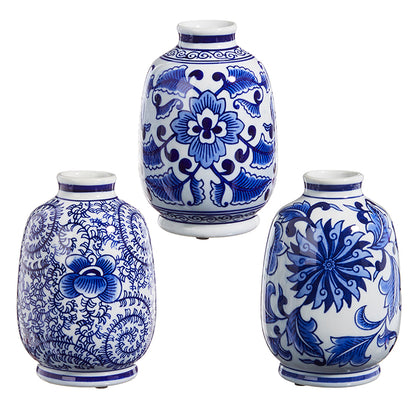 all three styles of blue chinoiserie bud vases displayed against a white background