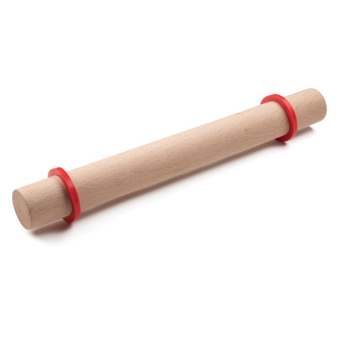 a set of silicone rolling pin rings displayed on a rolling pin on a white background