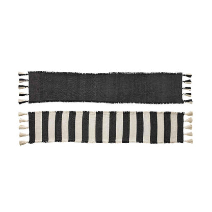 solid and stripe ponchaa table runners on a white background