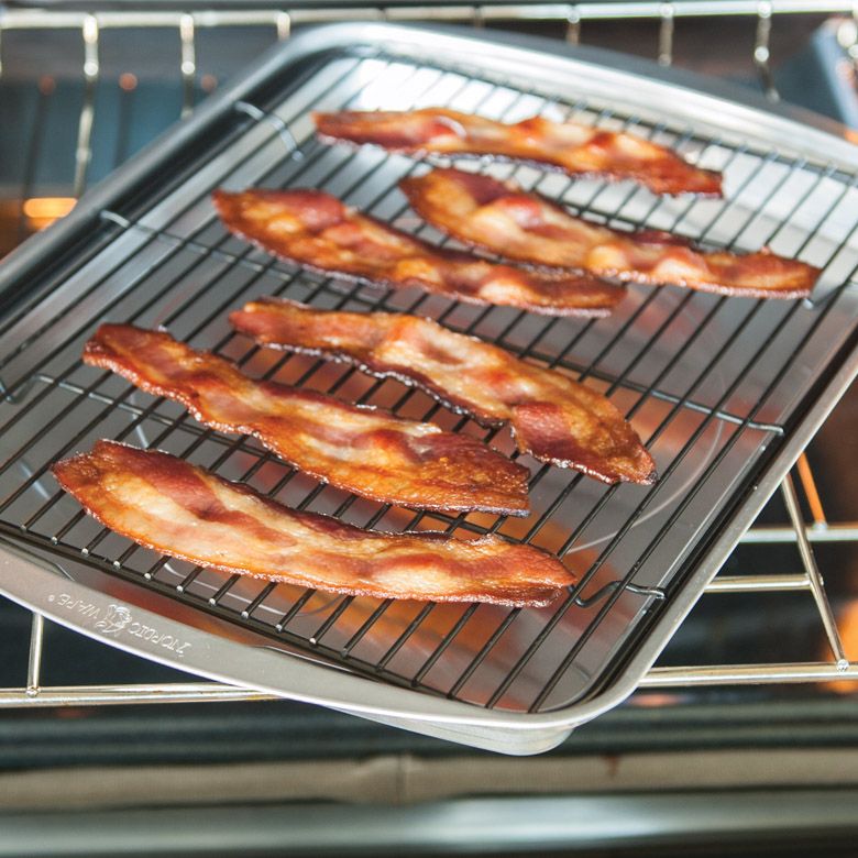 backing tray with bacon on rack.