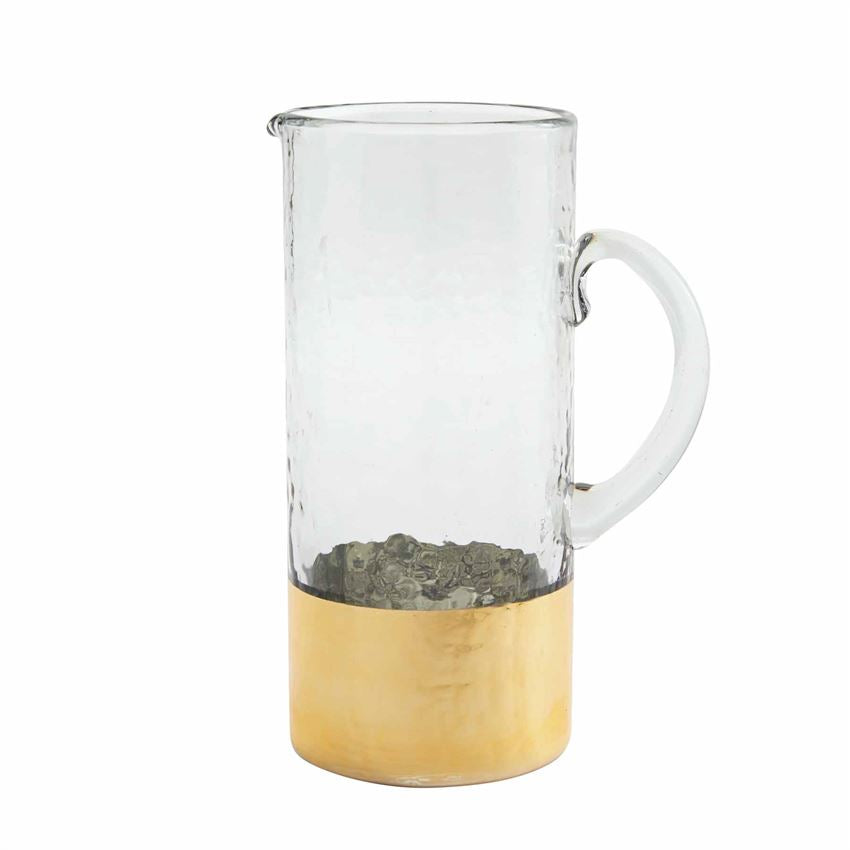 gold hammered glass pitcher on a white background
