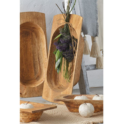 small and large mango wood dough bowls displayed with a purple floral arrangement 