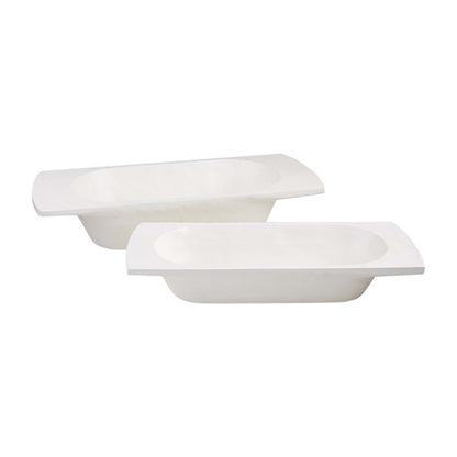 small and large white dough bowls on a white background