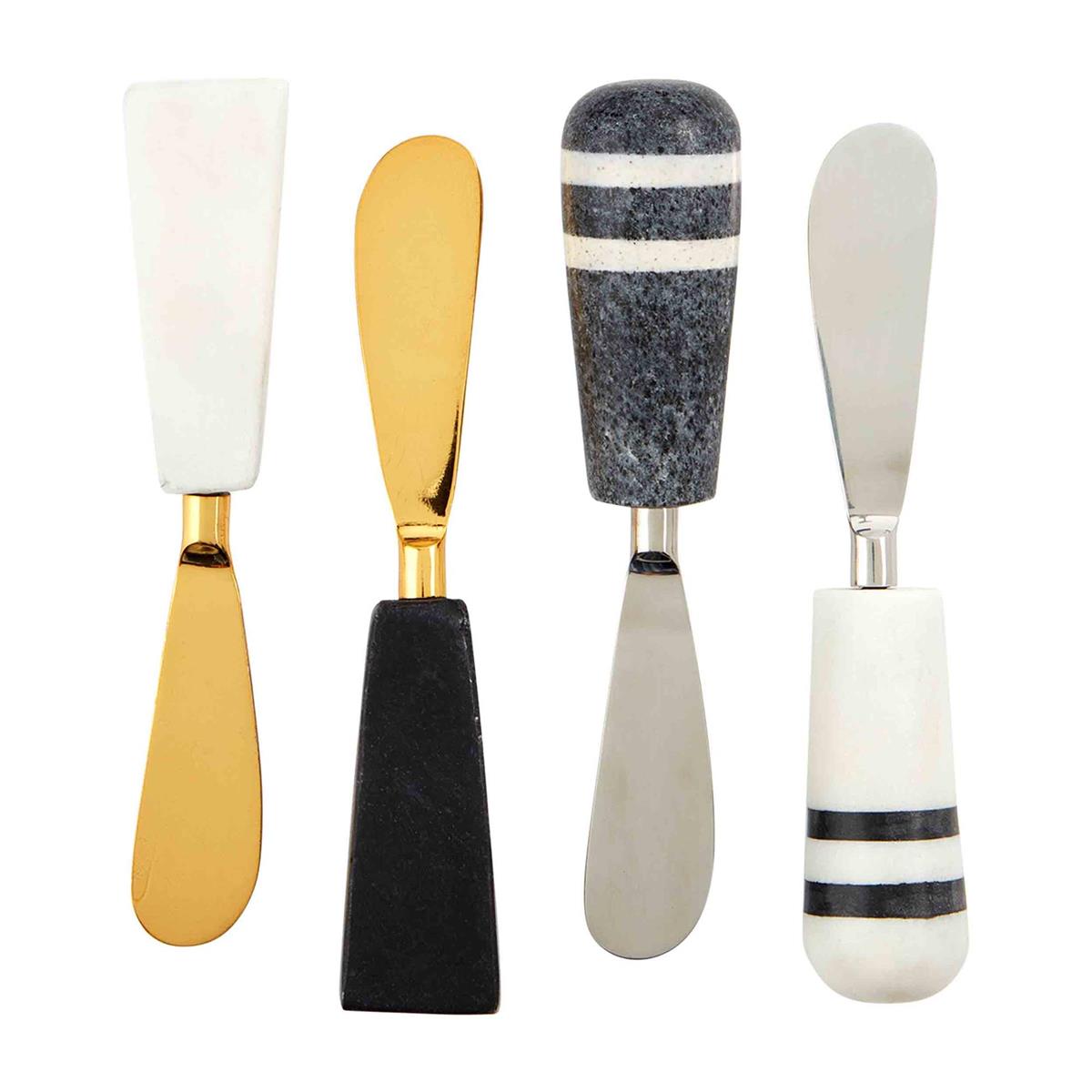 all four styles of marble handled spreaders on a white background