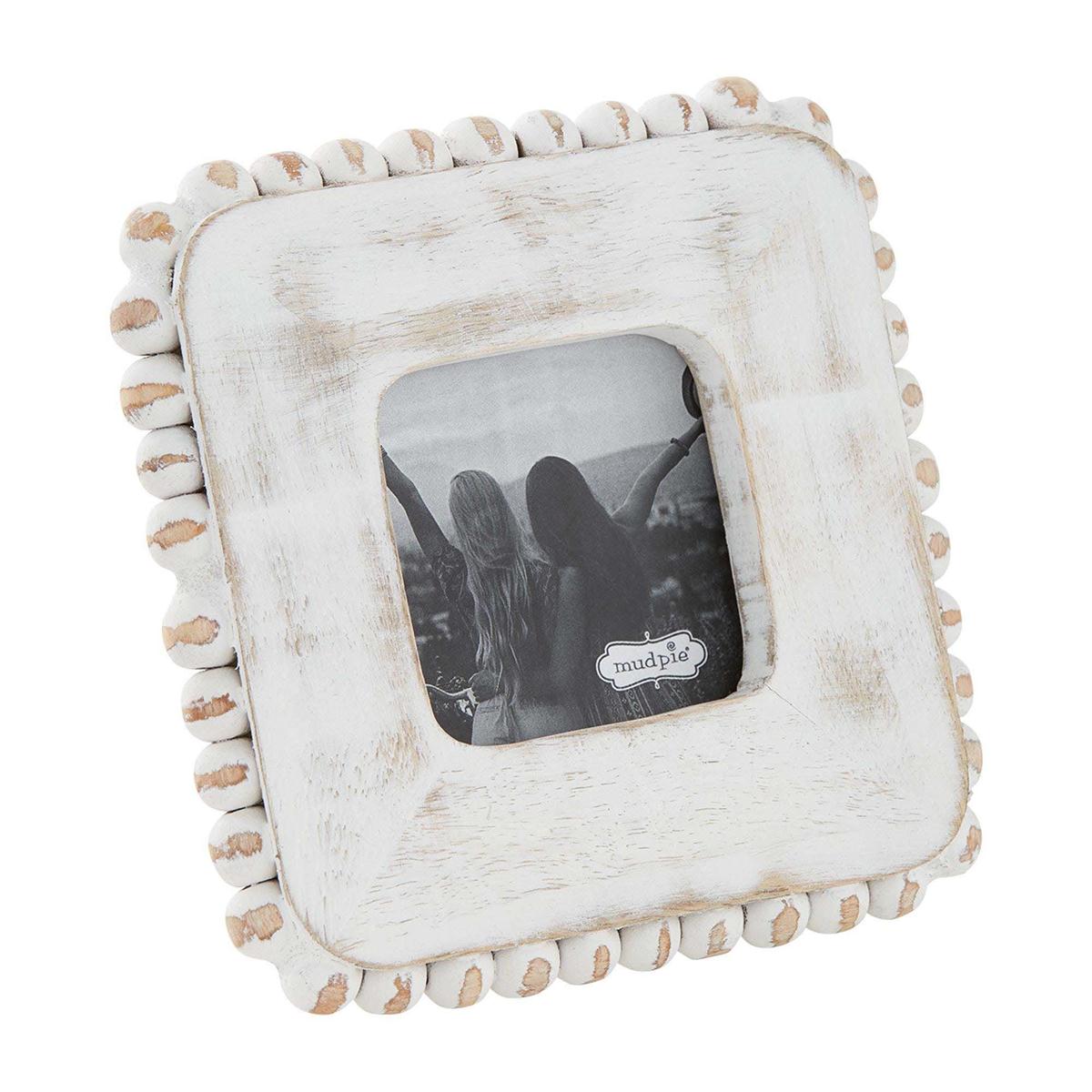small square white beaded frame displayed against a white background
