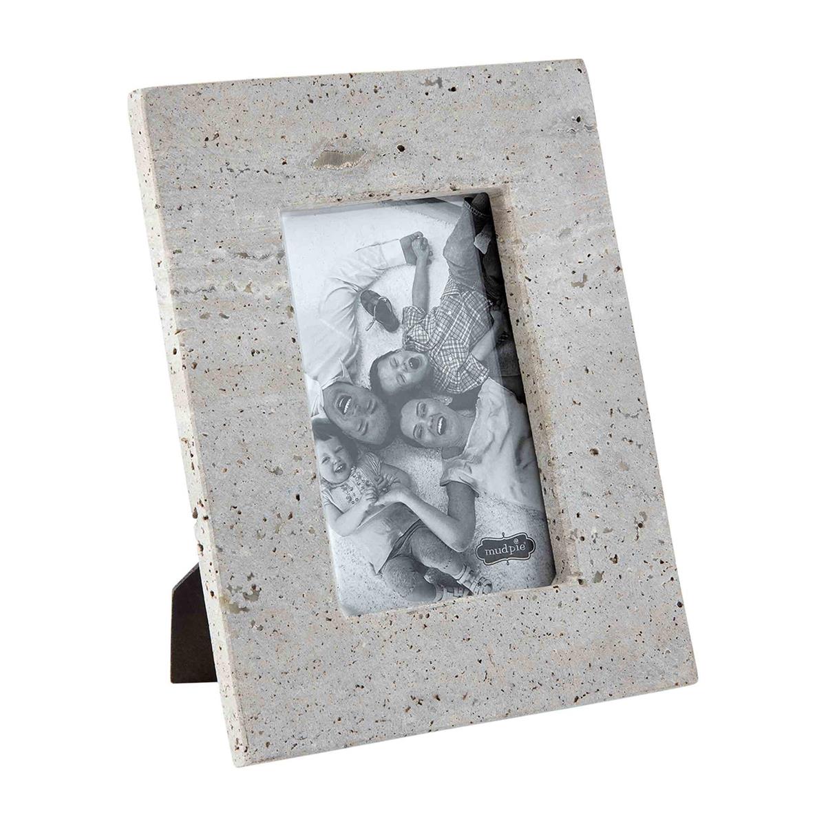 small gray travertine frame on a white background