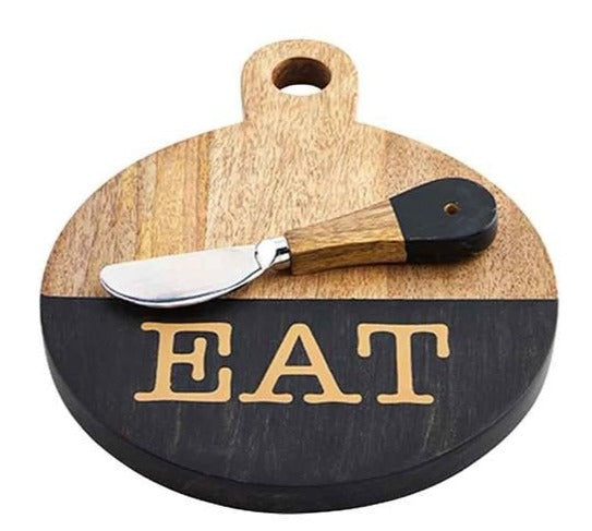 "eat"  board and spreader on a white background.