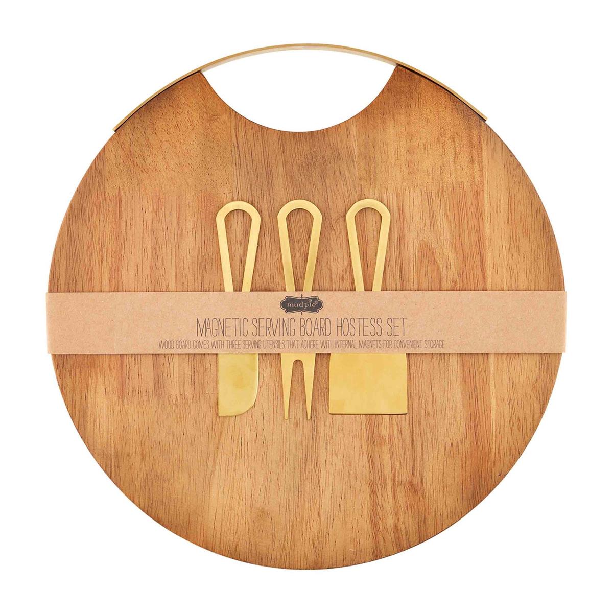 magnetic round serving board with three cheese knives on a white background
