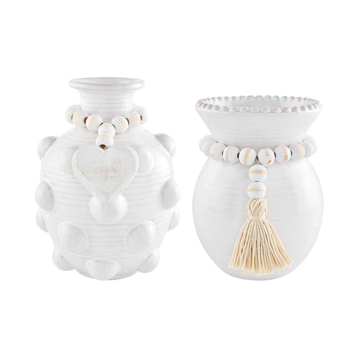 heart and tassel raised dot pendant vases on a white background