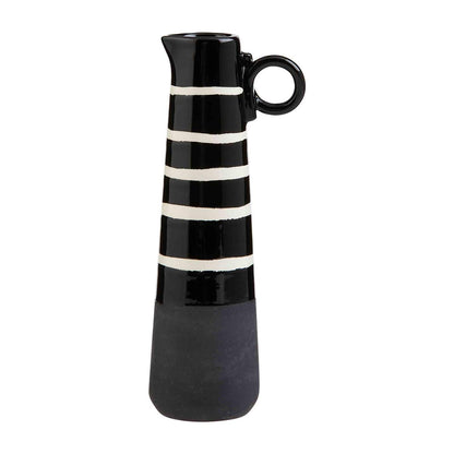 large vase has black and white horizontal stripes with a matte black bottom against a white background