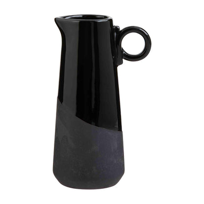 small vase has a gloss black and matte black finish against a white background