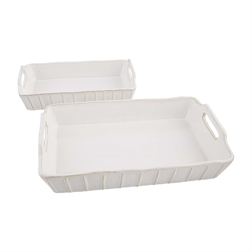 small and large textured baking dishes displayed on a white background