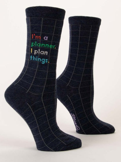 side view of i'm a planner i plan things crew socks on a white background