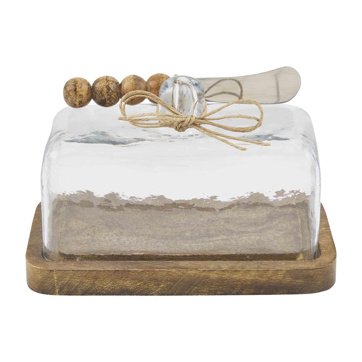 beaded butter dish with spreader on a white background