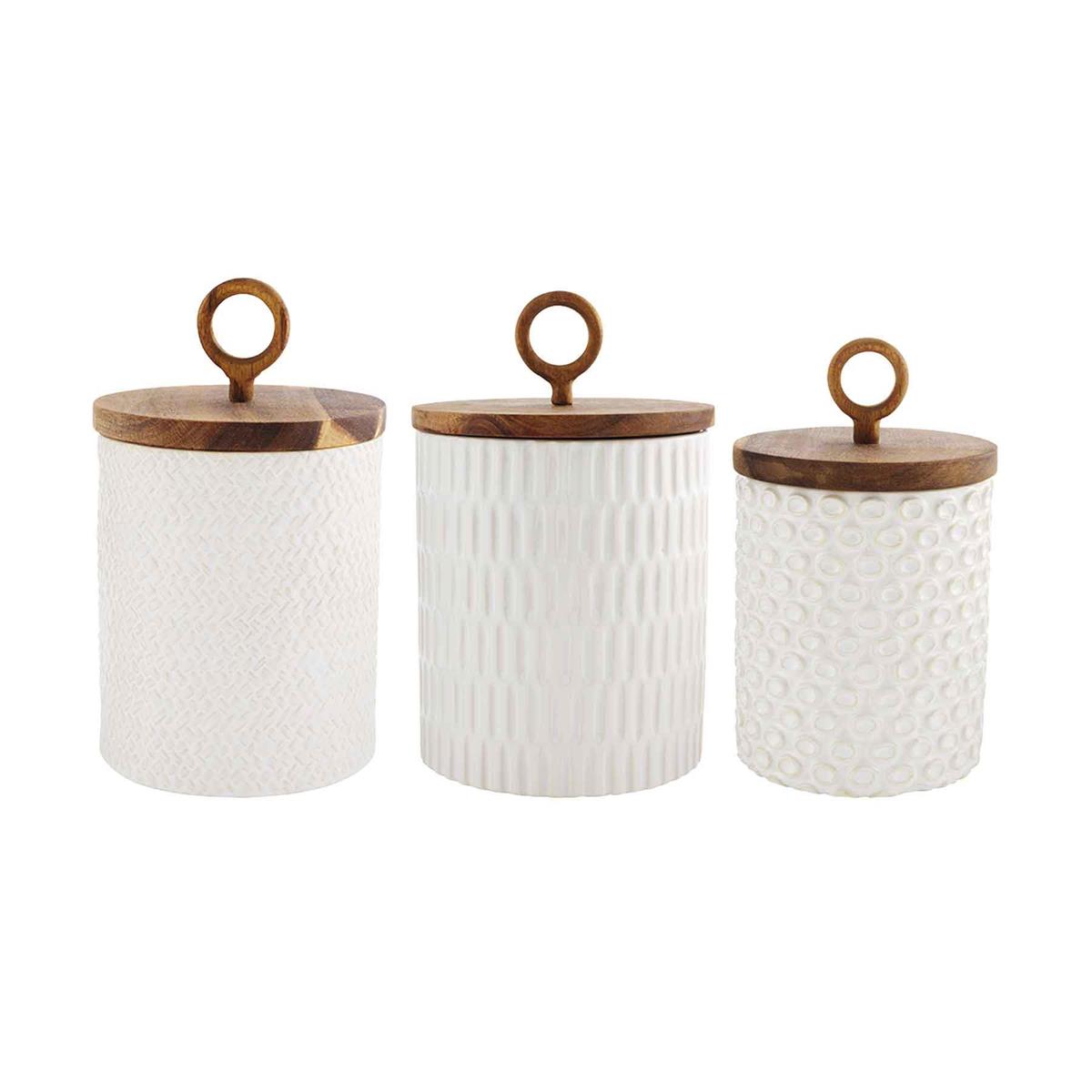 all three sizes of the textured stoneware canister set on a white background