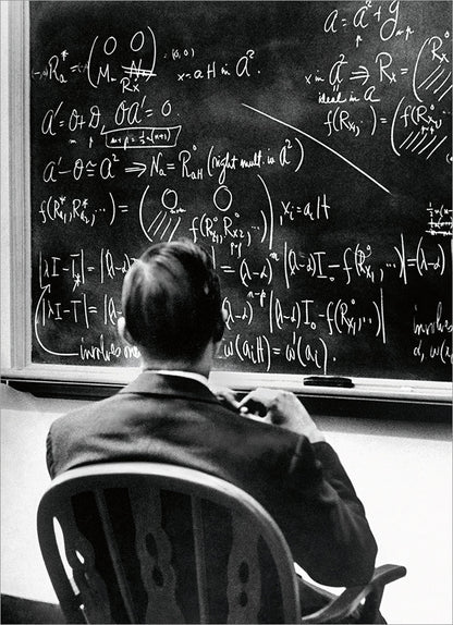 front card has black and white picture of a man sitting in a chair starring at a blackboard filled with an equation 