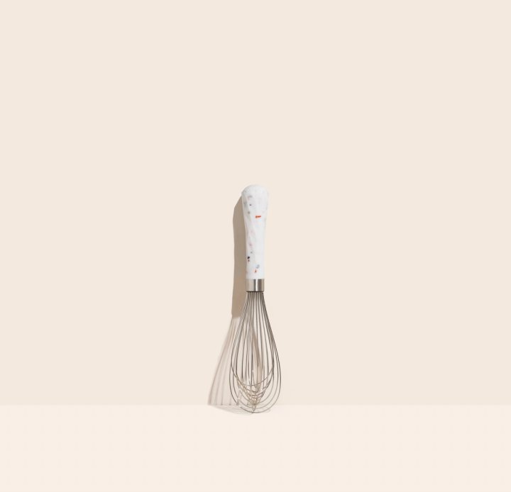 the barcelona mini whisk on a pale pink background