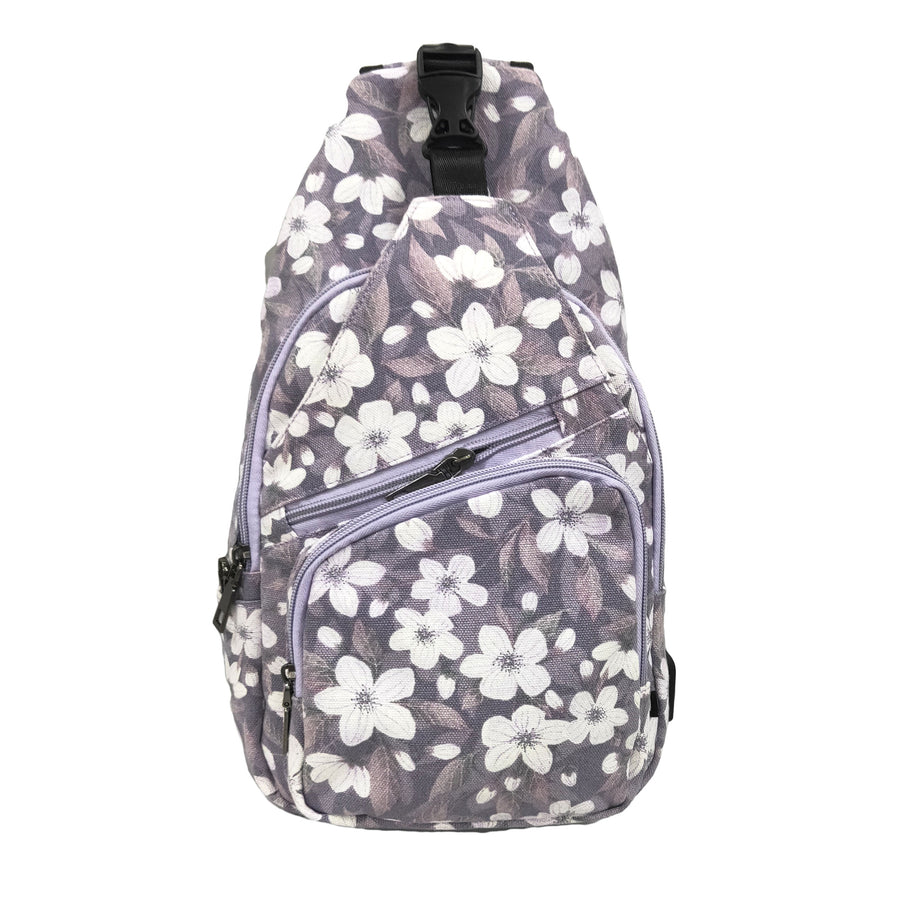 purple anti-theft daypack with floral design on a white background.