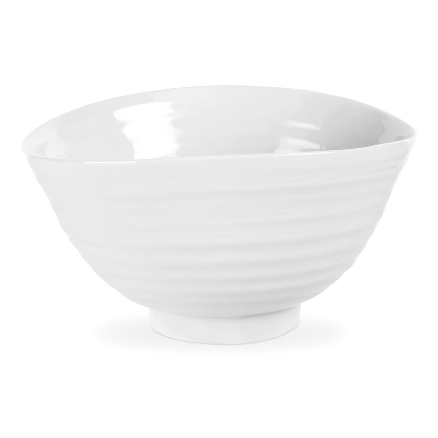 small white bowl with footed rim along the bottom.