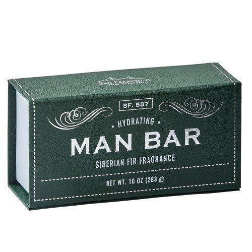 green rectangular box of soap on white background. box has "man bar" written in gold, swirling gold graphics above text, and gold dotted line bordering the box edges.