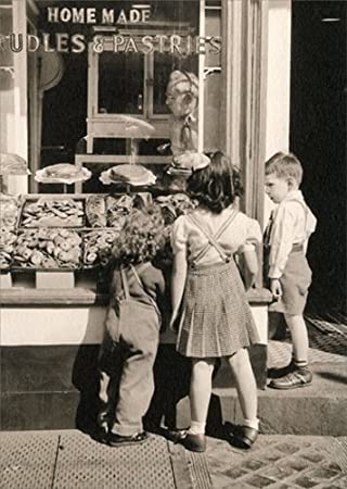 front of card is a photograph of children outside a shop window